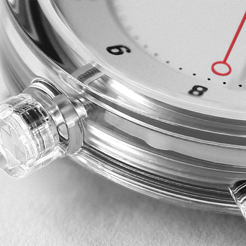 Close-up of TID No.3 transparent TR90 watch case with round-tip second hand detail