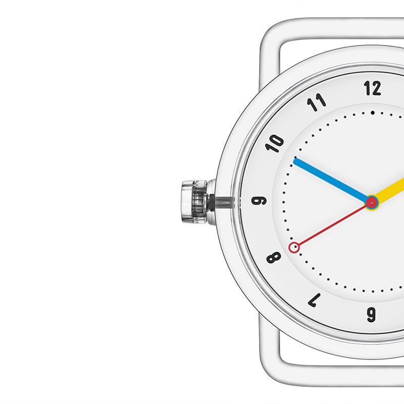 Close-up of TID No.3 white dial watch with 9 o’clock crown and transparent TR90 case