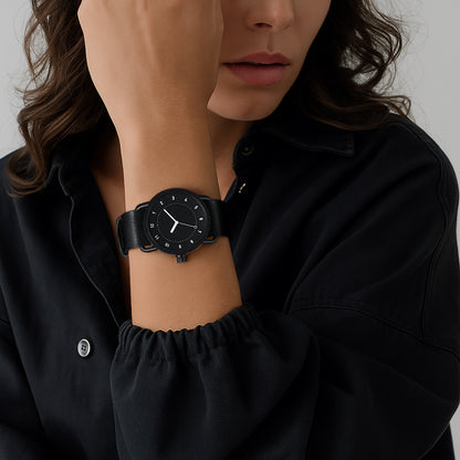 TID No.1 black dial minimalist watch worn with black outfit