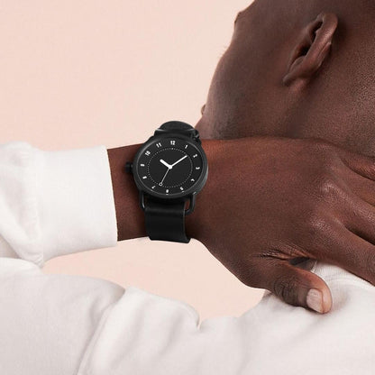 TID No.1 black dial minimalist watch worn with white shirt