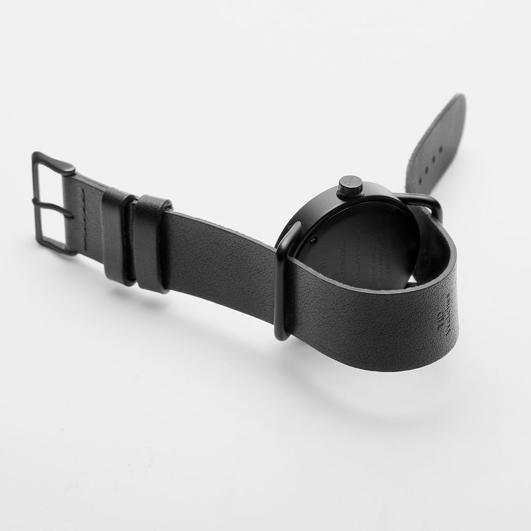 TID No.1 black leather strap watch back view with buckle and 9 o’clock crown