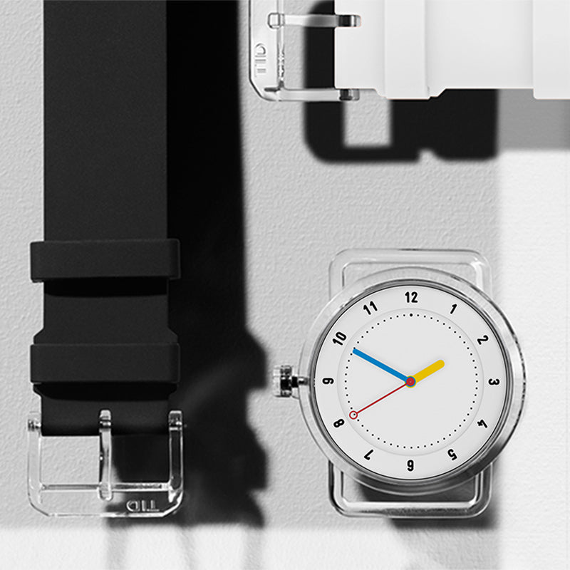 TID No.3 white dial watch with black and white interchangeable silicone straps